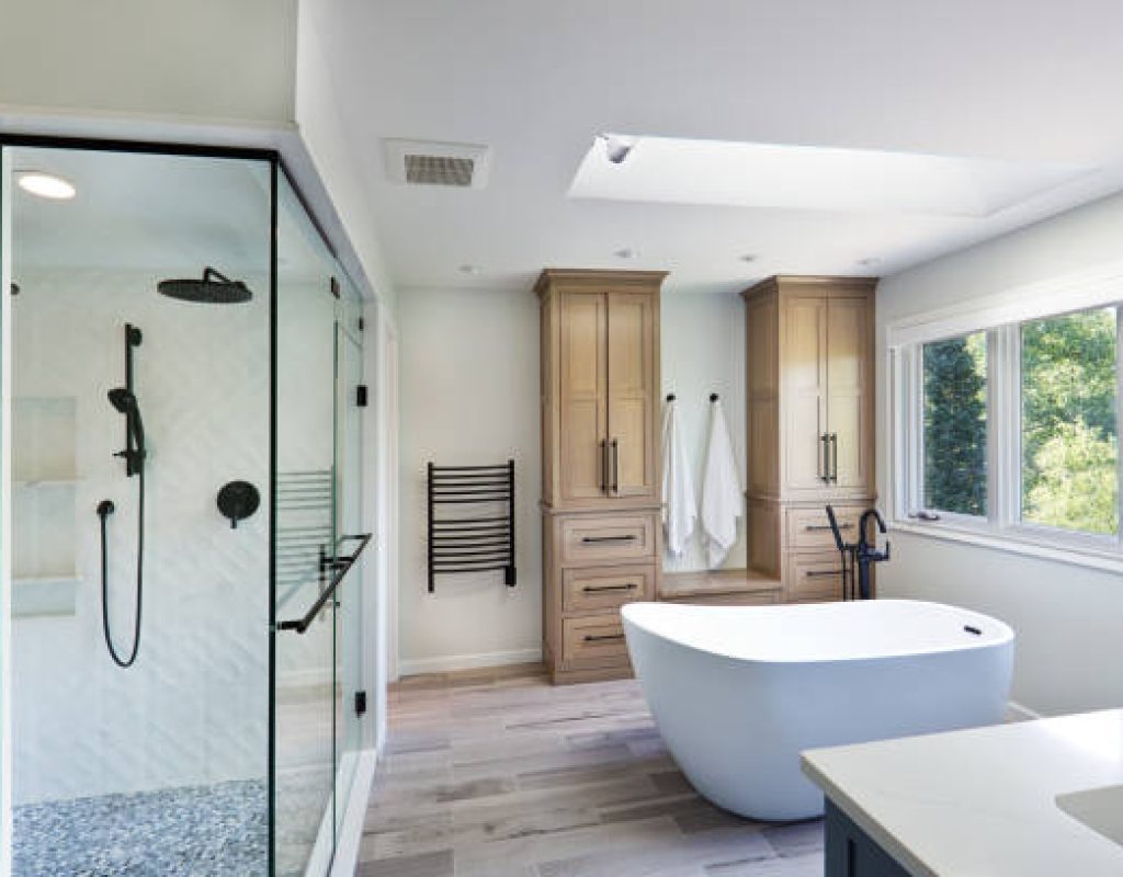 HLW BUILDERS, LLC renovating bathroom space with updated shower vanity and flooring