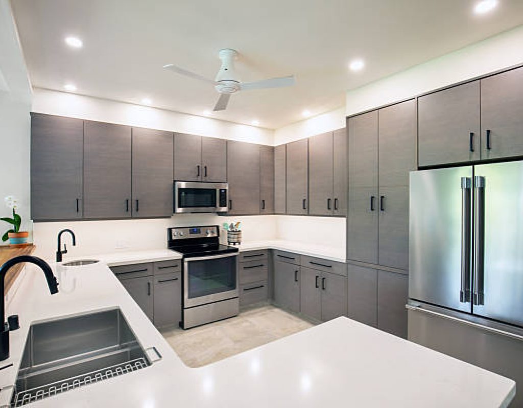 HLW BUILDERS, LLC upgrading kitchen with new countertops and lighting