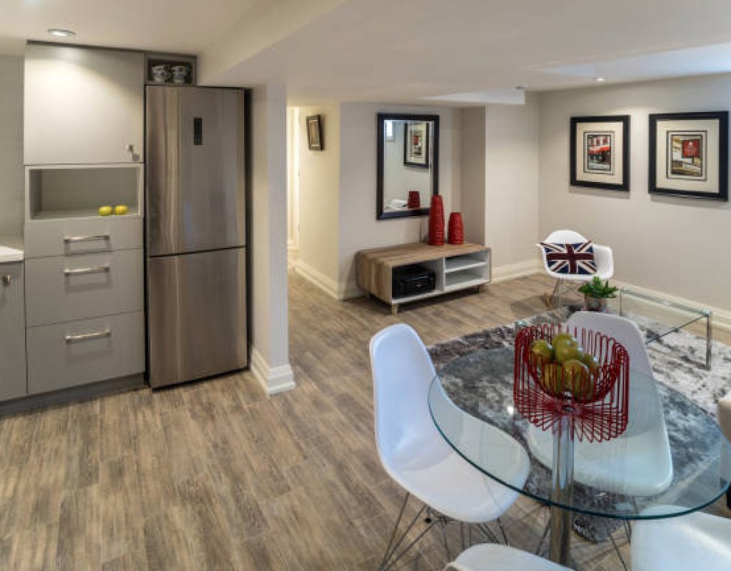 Finished basement family room created for Fitchburg homeowners needing comfortable extra living space